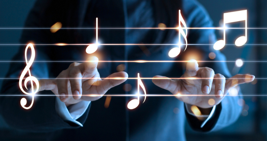 Woman hands playing music notes on dark background