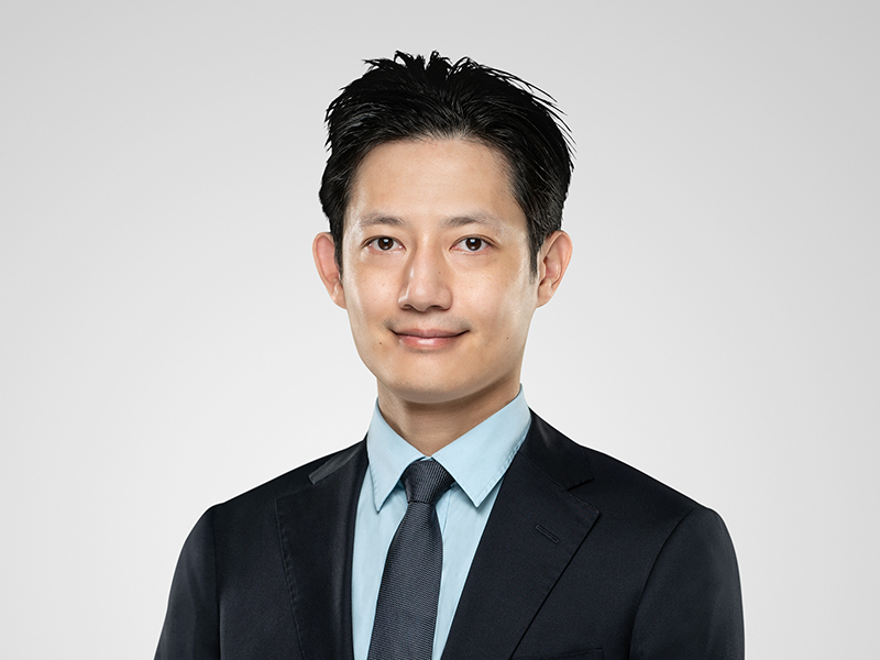 Yucheng Fan Harneys front portrait image on a grey background