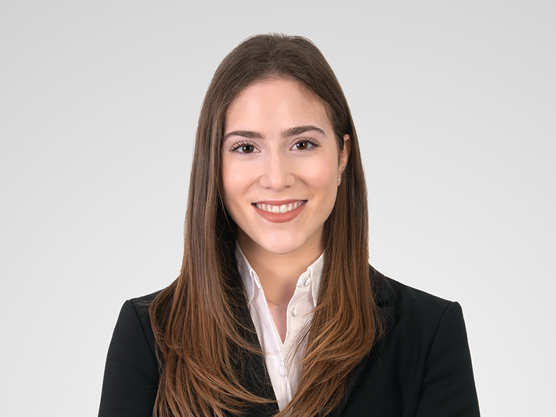 Anna Hadjixenophontos Harneys front portrait image on a grey background